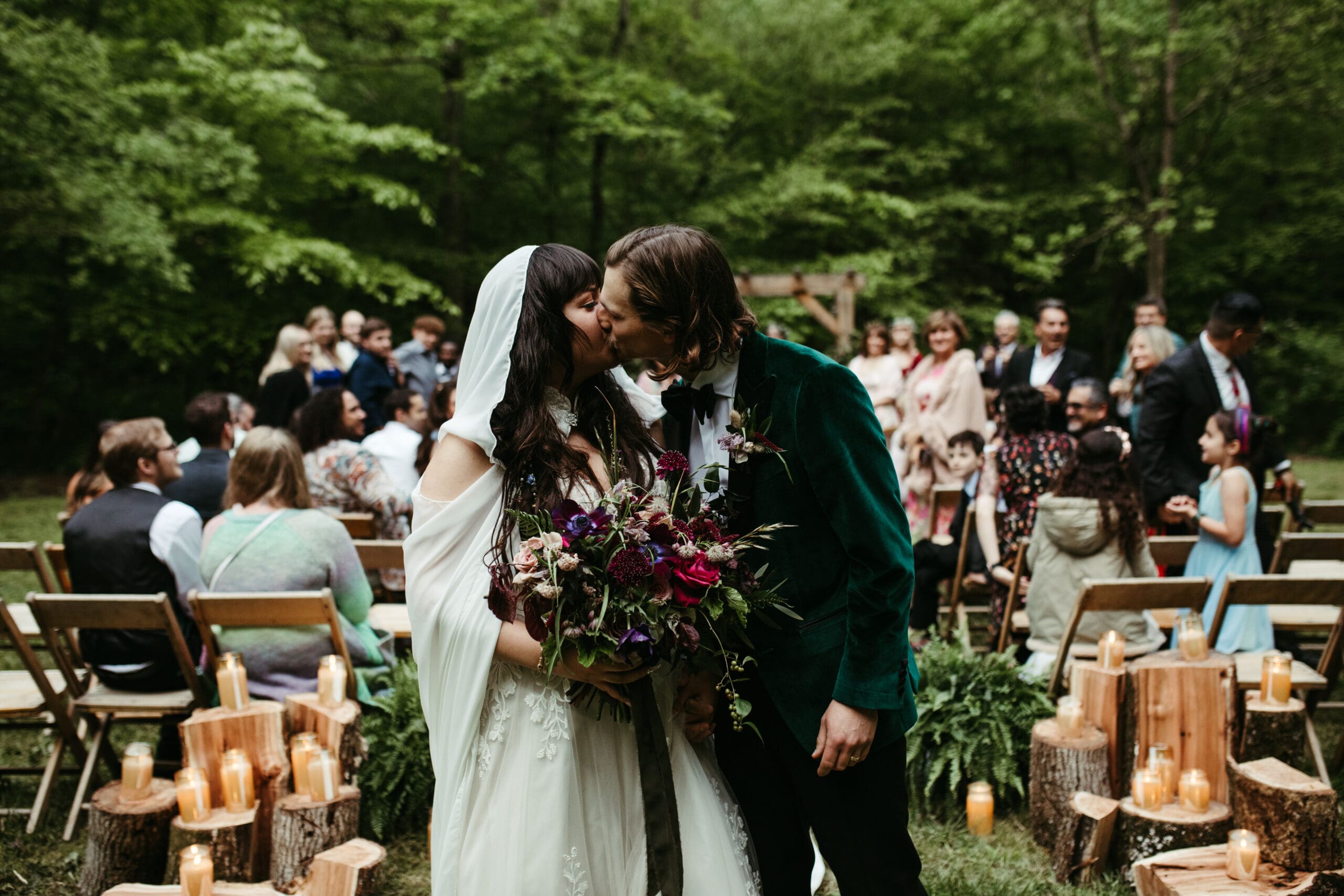 whimsical fairytale wedding outside in nature with dark moody florals